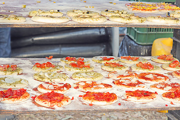 Image showing Preparing a tasty pizza in the oven