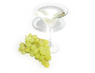 Image showing Very sweet white wine in the martini glasses isolated on white 