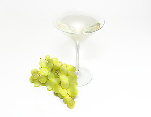 Image showing Very sweet white wine in the martini glasses isolated on white 