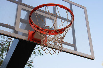 Image showing Basketball hoop against a blue sky.