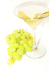 Image showing Very sweet white wine in the martini glasses isolated on white 