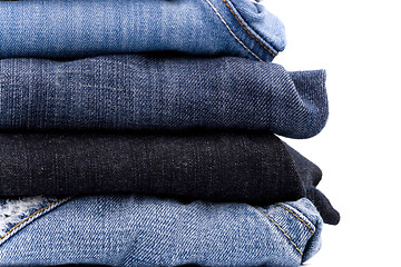 Image showing stack of blue jeans