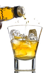 Image showing Pouring whiskey