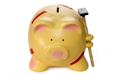 Image showing Piggy bank with hammer