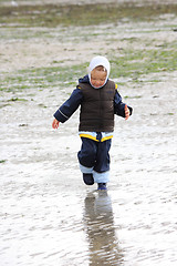 Image showing little girl on low tide tideland