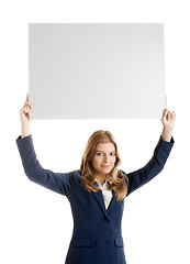 Image showing Business Woman holding a billboard