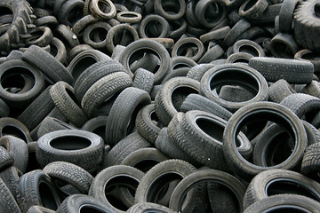 Image showing Old tires on junk yard