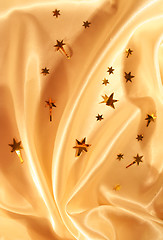 Image showing New year holiday golden satin as background 