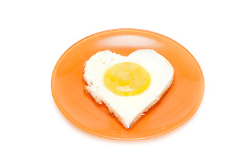 Image showing Fried egg in form heart on plate