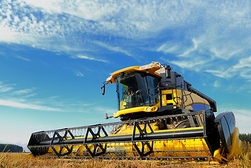 Image showing harvesting combine in the field