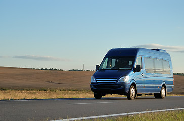 Image showing Blue minibus on highway