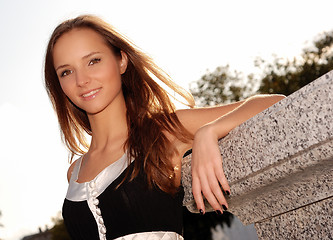 Image showing Beautiful young girl outdoors in summer