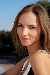 Image showing Beautiful young girl outdoors in summer