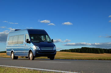 Image showing Blue minibus on highway