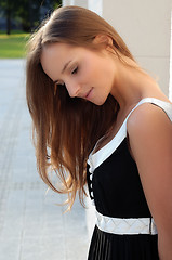 Image showing Beautiful young girl outdoors in summer