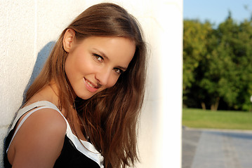 Image showing Beautiful young girl outdoors in summer