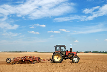 Image showing Agriculture ploughing tractor outdoors