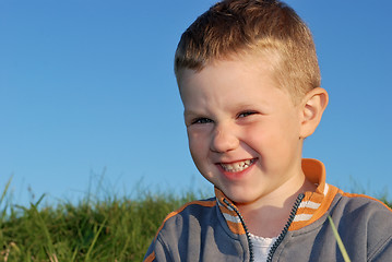 Image showing Smiling boy outdoors