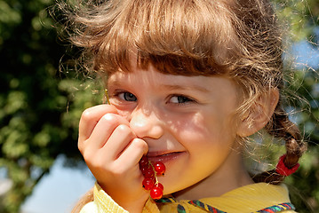 Image showing girl with red currants