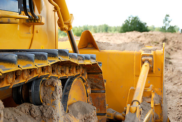 Image showing bulldozer track in action