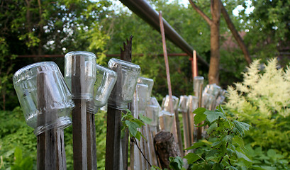 Image showing Fence with Jars