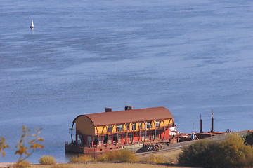 Image showing Floating boat station on the river