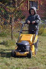 Image showing mowing grass