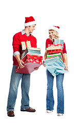 Image showing Christmas shopping couple carrying gifts