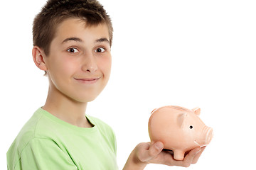 Image showing Boy holding a money box