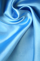 Image showing Smooth elegant blue silk as background