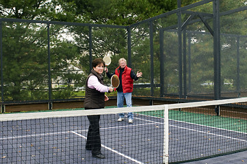 Image showing man and woman playing paddle platform tennis