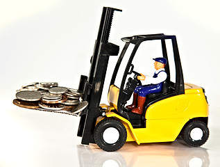 Image showing Fork lift and money