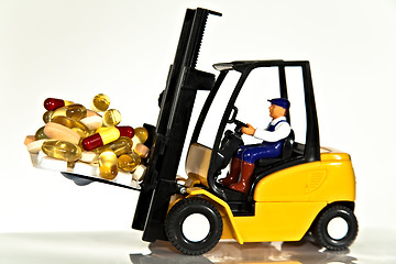 Image showing Fork lift and tablets