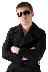 Image showing man in black coat with sunglasses