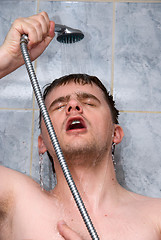 Image showing man in a shower