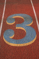 Image showing Number Three on a Running Lane