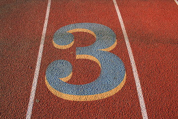 Image showing Number Three on a Running Lane