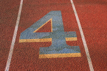 Image showing Number Four on a Running Lane