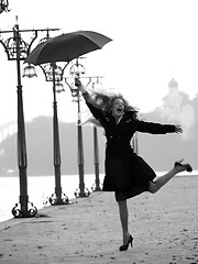 Image showing Weird blonde with umbrella