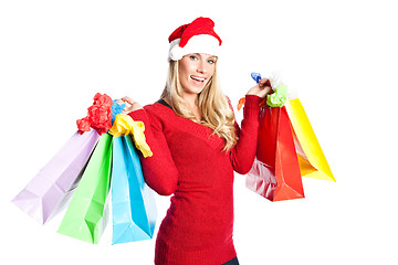 Image showing Christmas shopping santa girl