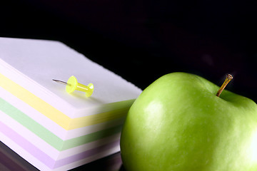 Image showing Green apple with the block for records