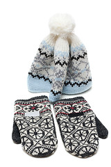 Image showing Knitted mittens and nodding