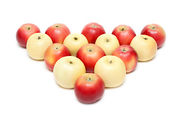 Image showing Red and yellow apple put by triangle