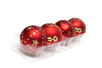 Image showing Red cristmas balls in row