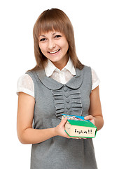 Image showing Young girl with dictionary english