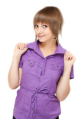 Image showing Young girl in violet blouse flirts