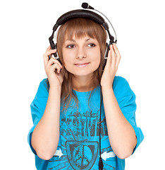 Image showing Girl in earphone smiles, portrait