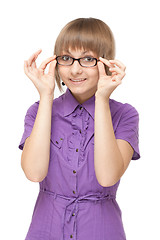 Image showing Young girl in violet blouse and spectacles