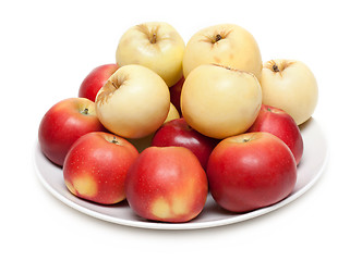 Image showing Red and yellow apple on plate