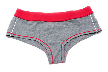 Image showing Feminine underclothes, gray panties and red band